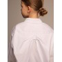 Нарядная белая школьная блузка с бантом на спине